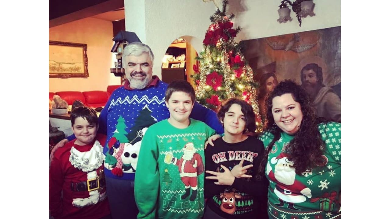 Christina Pastor con su esposo e hijastros.