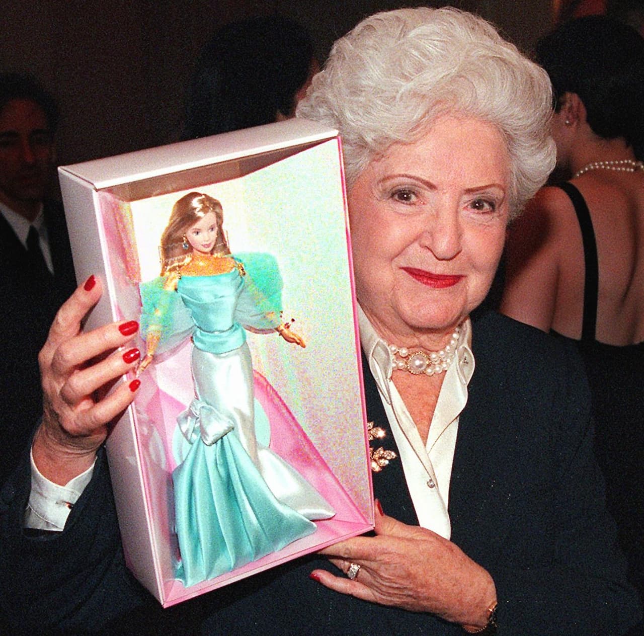 NEW YORK, UNITED STATES: Ruth Handler, Mattel Inc. co-founder and inventor of the Barbie Doll, displays the special 40th Anniversary Barbie at a press conference 07 February in New York City. A group of ten inspirational women were recognized at the press conference as "Ambassadors of Dreams" in a program designed to encourage and inspire young women. AFP PHOTO/Matt CAMPBELL (Photo credit should read MATT CAMPBELL/AFP via Getty Images)
