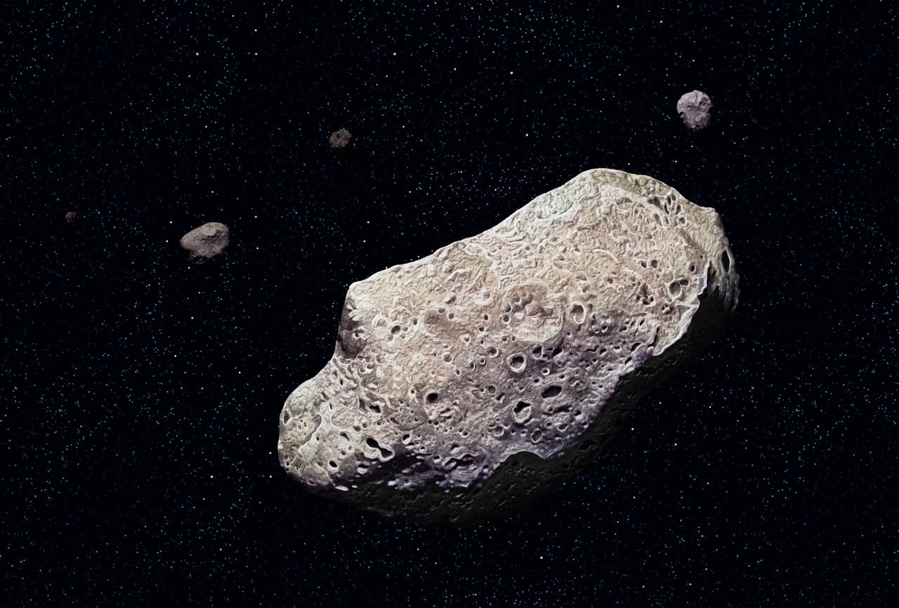 Ida, Ida, discovered by the Galileo probe in 1993, is 52 km long and has a tiny moon, Dactyl. (Photo by: QAI Publishing/Universal Images Group via Getty Images)