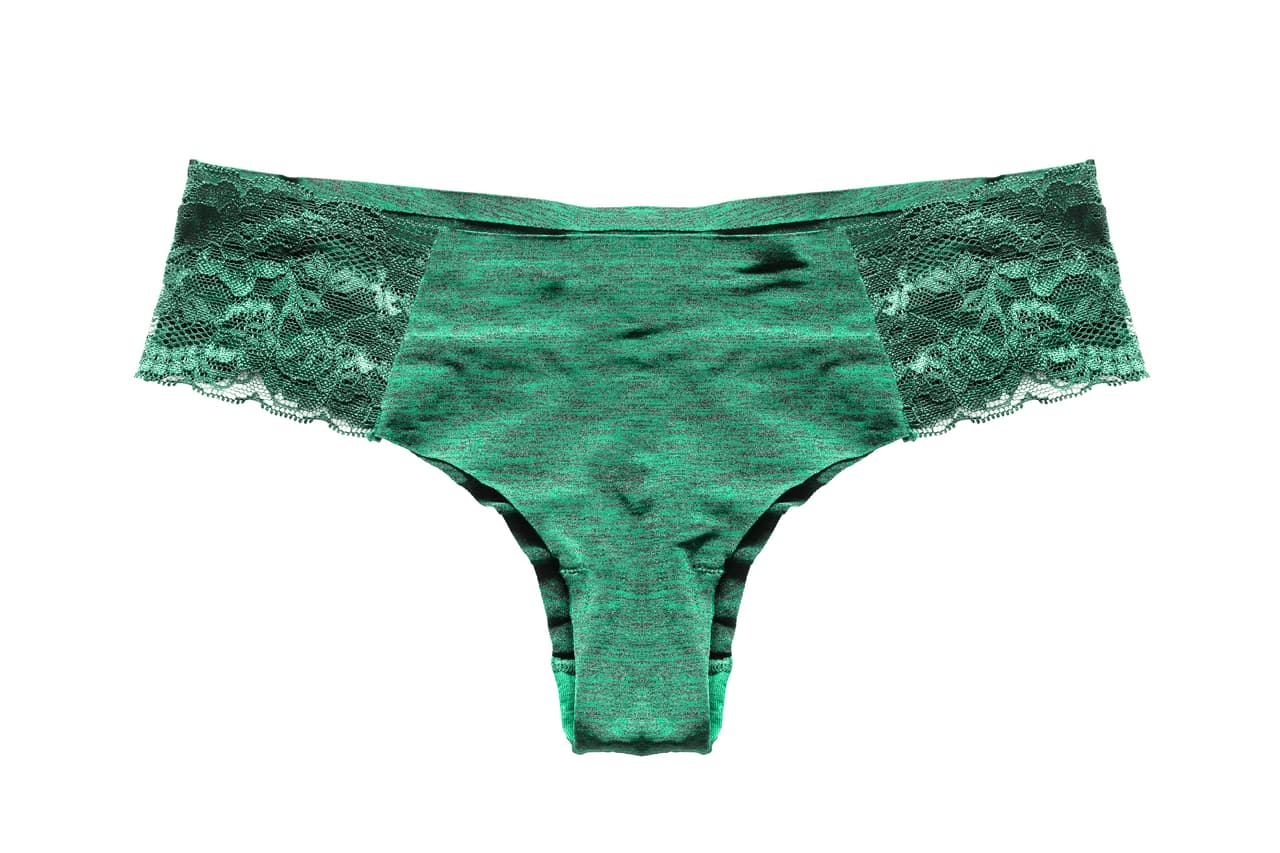 Silk lacy cyan panties on white background