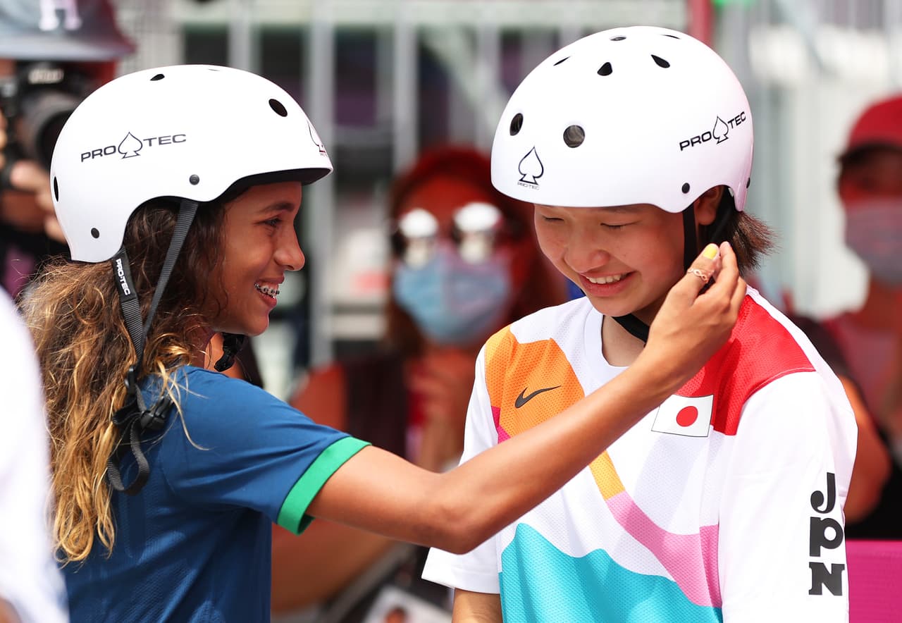 TOKYO, JAPAN - JULY 26: Rayssa Leal of Team Brazil puts her hand up to the face of Momiji Nishiya of Team Japan during the Women's Street Final on day three of the Tokyo 2020 Olympic Games at Ariake Urban Sports Park on July 26, 2021 in Tokyo, Japan. (Photo by Patrick Smith/Getty Images)