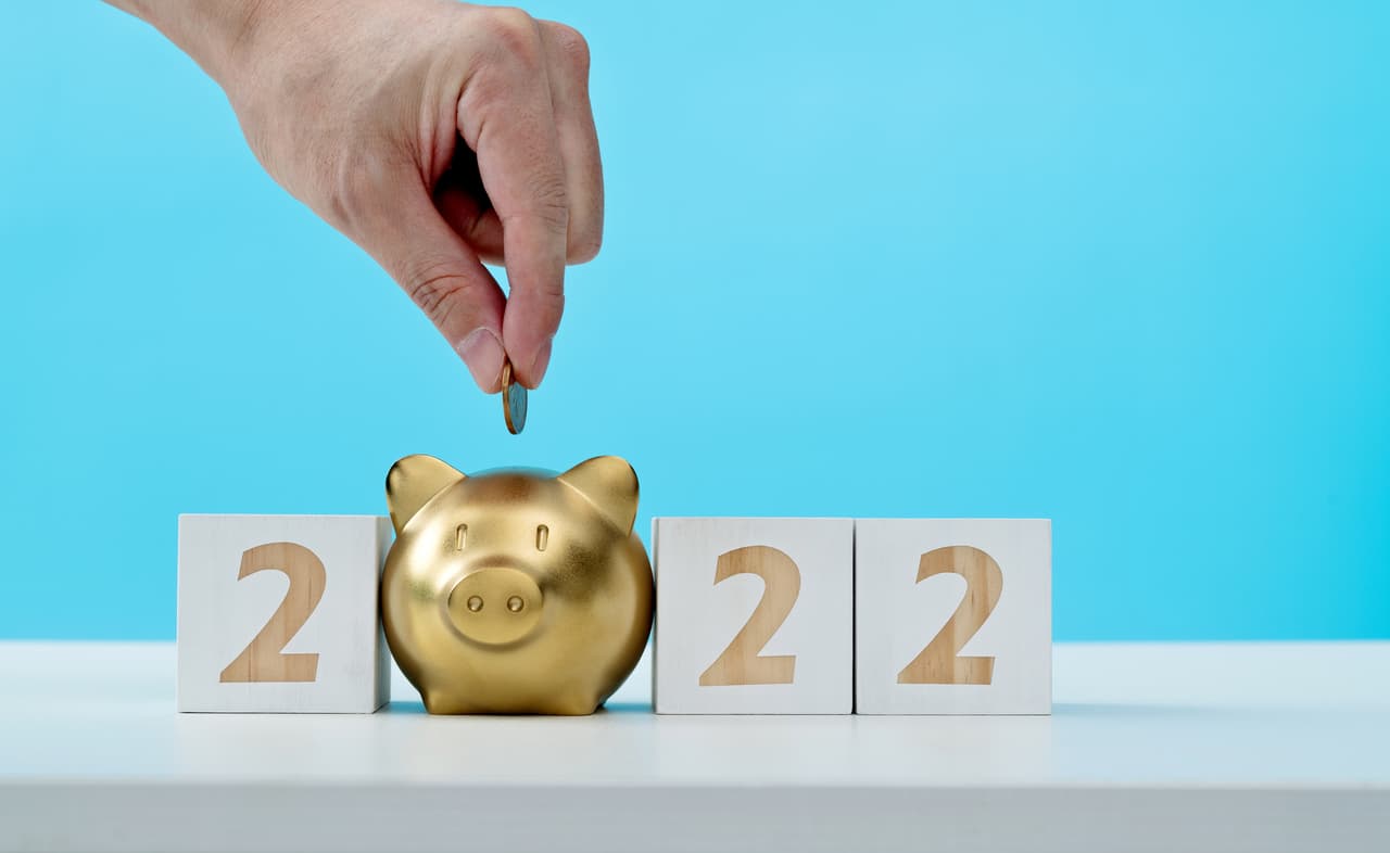 2022 new year and piggy bank on the table.
