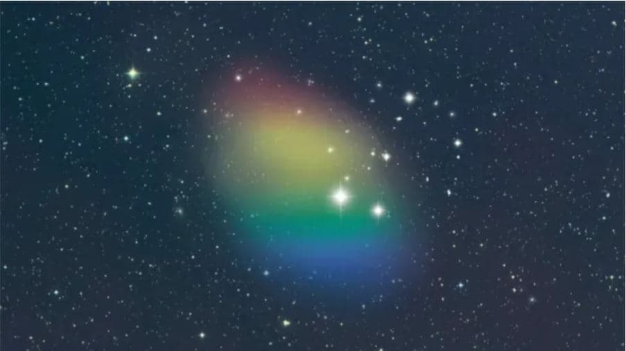 Representación artística del gas hidrógeno observado en la galaxia J0613+52. Los colores indican la probable rotación del gas en relación con el observador (rojo=lejos, azul=hacia). Esta imagen fue tomada usando un campo estelar de STScI POSS-II con ilustraciones adicionales de NSF/GBO/P.Vosteen.