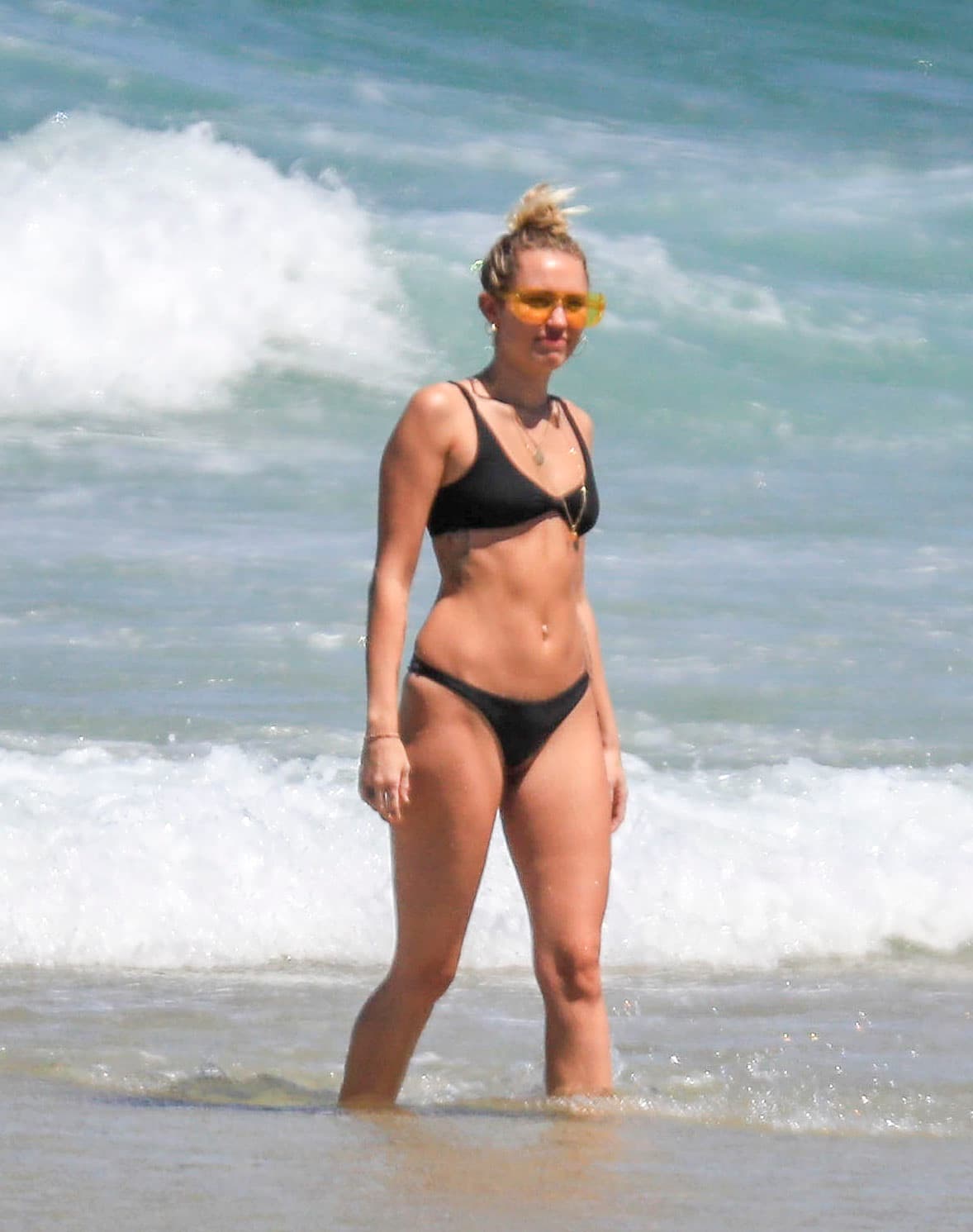 Photo © 2018 Splash News/The Grosby Group PREMIUM EXCLUSIVE Byron Bay, Jan 18 2018 Miley Cyrus and Liam Hemsworth hit the beach in Byron Bay as they continue their Aussie summer vacation. Pictured: Miley Cyrus and Liam Hemsworth