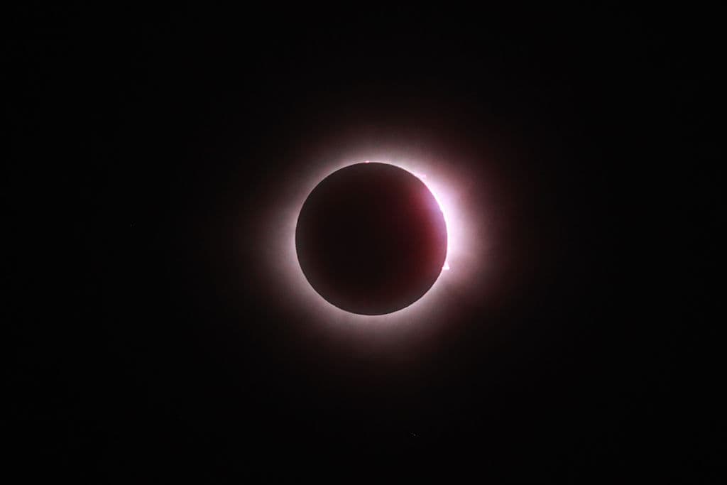 MAZATLAN, MEXICO - APRIL 08: The sun disappears behind the moon during the Great North American Eclipse on April 08, 2024 in Mazatlan, Mexico. Millions of people have flocked to areas across North America that are in the "path of totality" in order to experience a total solar eclipse. During the event, the moon will pass in between the sun and the Earth, appearing to block the sun. (Photo by Hector Vivas/Getty Images)