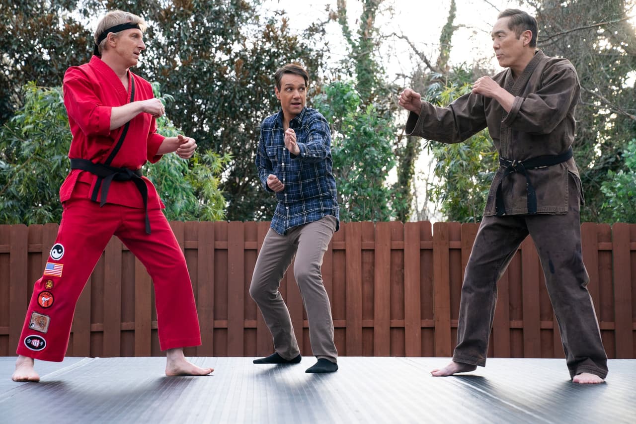 Cobra Kai. (L to R) William Zabka as Johnny Lawrence, Ralph Macchio as Daniel LaRusso, Yuji Okumoto as Chozen in Cobra Kai. Cr. Curtis Bonds Baker/Netflix © 2024