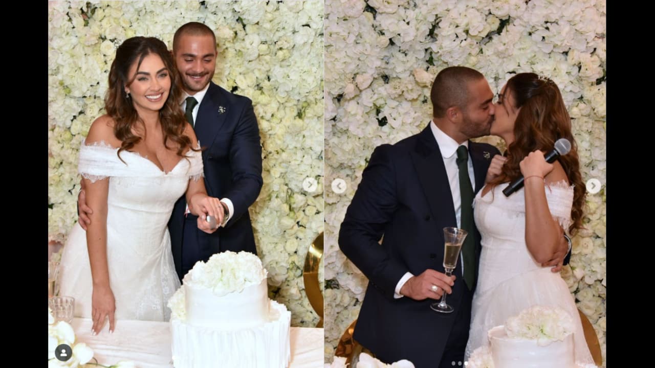 Claudia Martín y Carlos Said posaron frente a su pastel de bodas